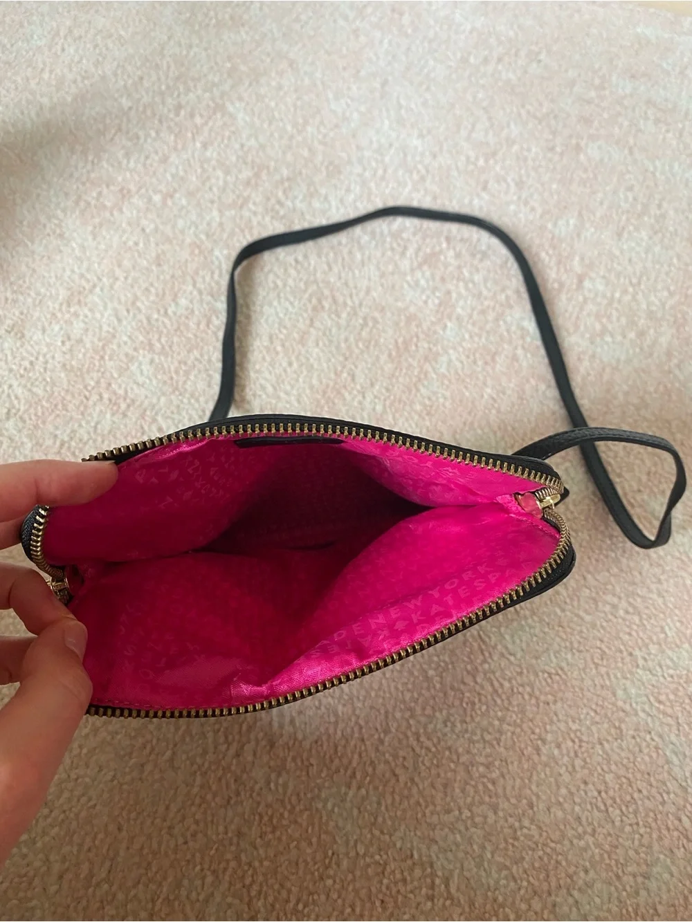 Kate Spade Black Pebbled Leather Crossbody Bag with pink interior